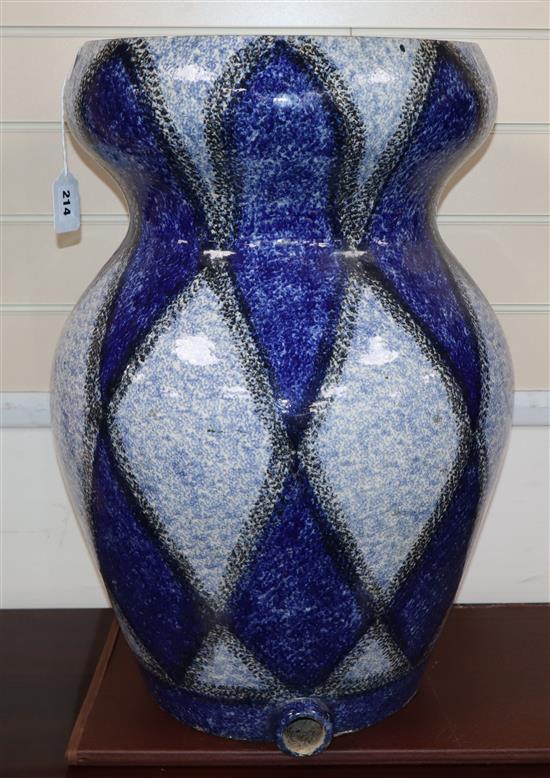 A large ceramic water filter height 61.5cm